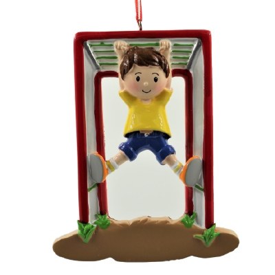 BOY ON JUNGLE GYM