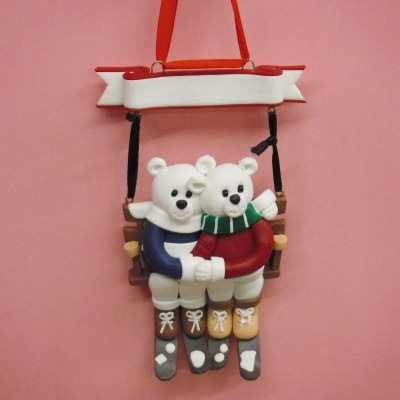 BEAR COUPLE ON SKI LIFT