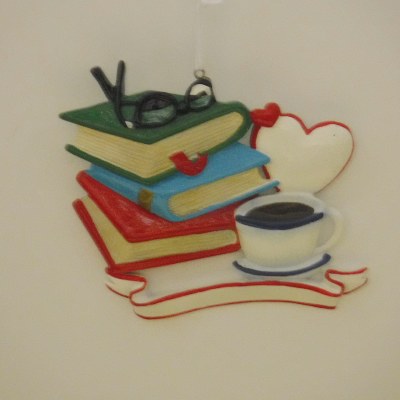 STACK OF BOOKS AND COFFEE