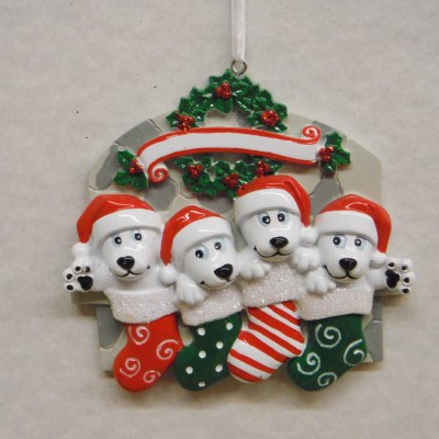 FAMILY OF 4 PUPPIES IN STOCKINGS