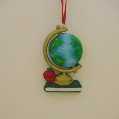 TEACHING - GLOBE ON BOOK WITH APPLE