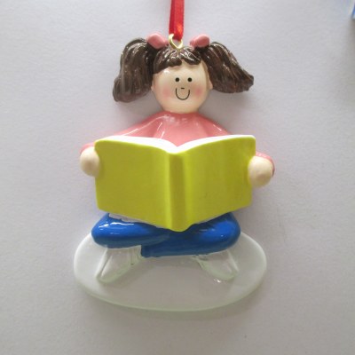 GIRL READING BROWN HAIR
