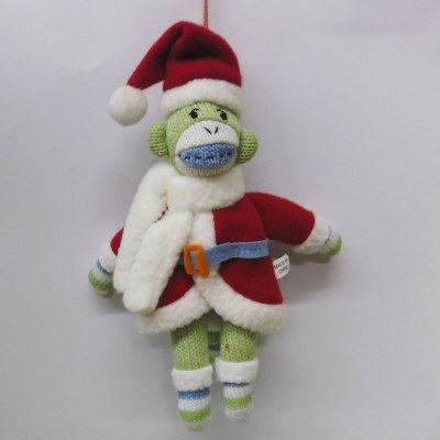 SOCK MONKEY IN SANTA SUIT