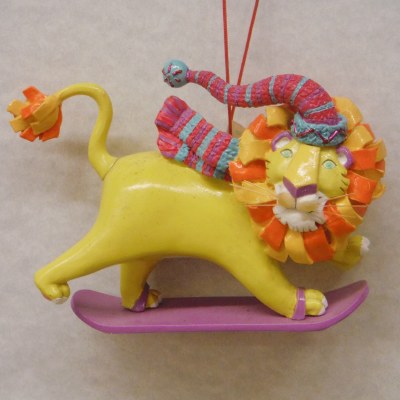 LION ON A SNOWBOARD