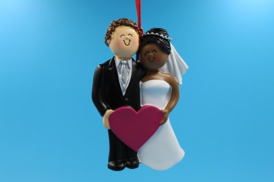 BRN HAIR GROOM AND BLACK BRIDE