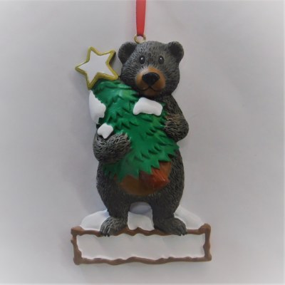 BLACK BEAR WITH TREE