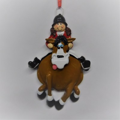 COWGIRL RIDING A HORSE