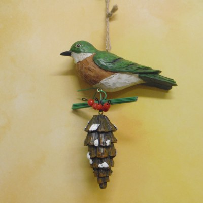 BIRD ON PINECONE