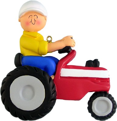 CHILD RIDING RED TRACTOR
