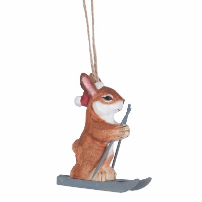 CARVED WOODEN RABBIT ON SKIES