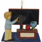 TEACHER AT CHALK BOARD