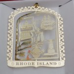 RHODE ISLAND BRASS ORNAMENT