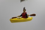 YELLOW KAYAK WITH KAYAKER
