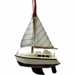 RED  WOODEN YACHT WITH SAILS