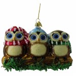 GLASS OWLS ON BRANCH