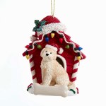 GOLDENDOODLE WITH DOG HOUSE