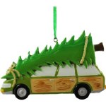 STATION WAGON CARRYING TREE