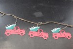 RED TRUCK WITH TREE GARLAND