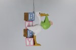 STORK CARRYING BABY