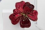 RED CLIP ON FLOWER