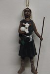 SHEPHERD WITH STAFF HOLDING LAMB