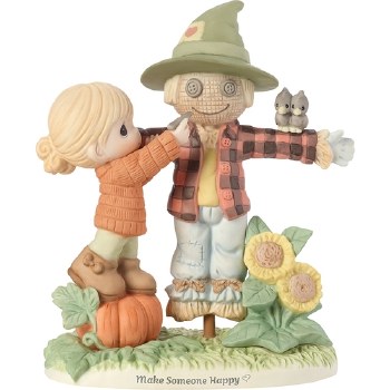 P/M GIRL WITH SCARECROW FIGURINE