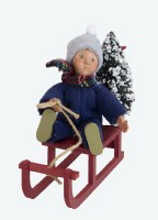 BYERS' CHOICE TODDLER ON SLED