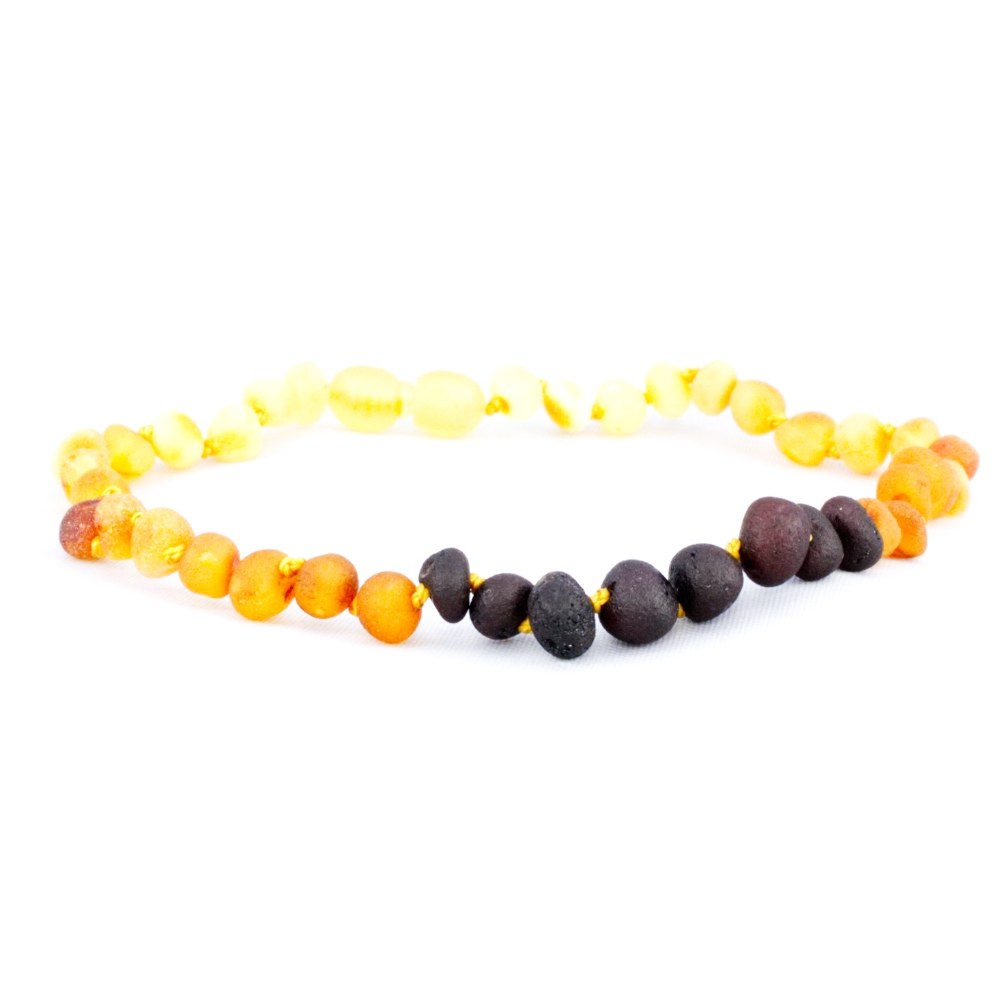 the amber monkey teething necklace