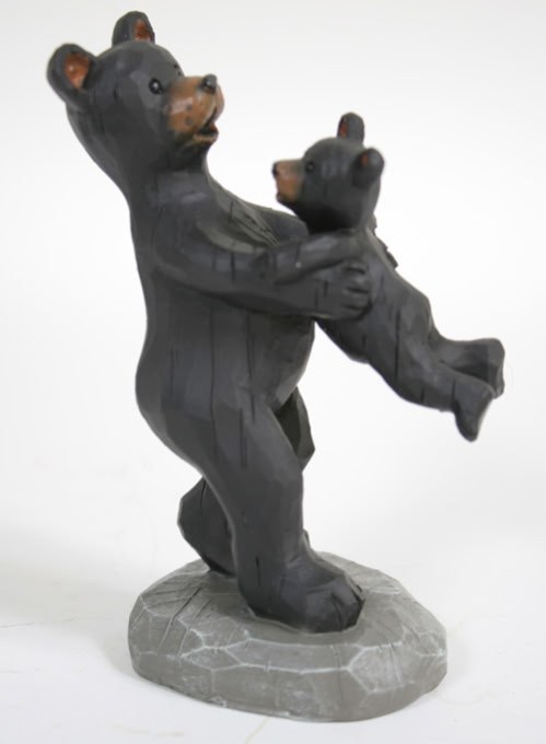 Bear Swinging Baby