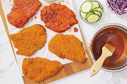 Reuven Fully Cooked Hot & Spicy Breaded Chicken Breast 5oz - 2 x 2KG - SOLD BY CASE - (1) (24100)