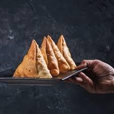 Sai Krishna Large Veg/Vegan Samosa Half Fry - 50/CASE