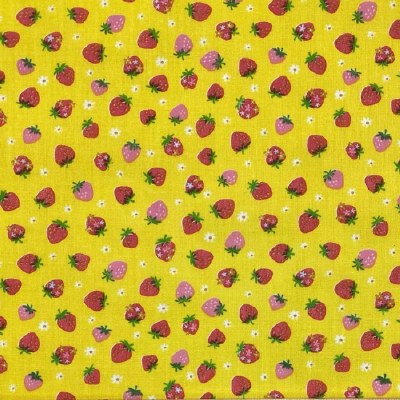 Strawberries on yellow background