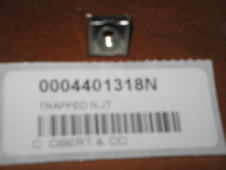 TRAPPED NUT