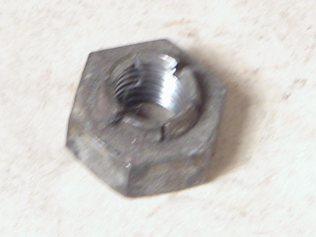 ROCKER ARM STAND TO HEAD NUT