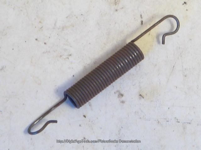 GLOVE BOX DOOR SPRING
