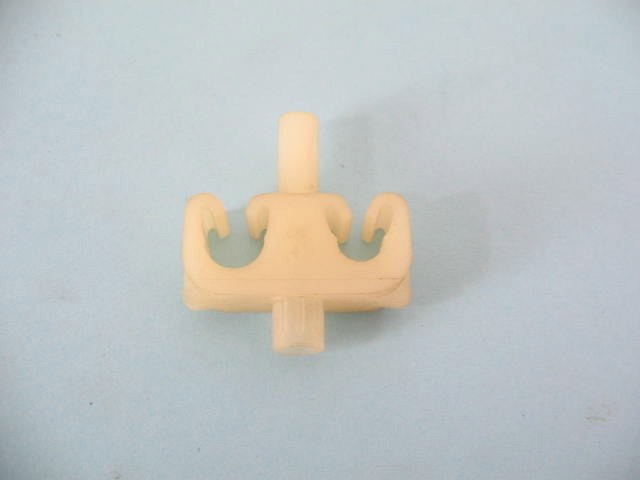 UNKNOWN SMALL PLASTIC BRACKET