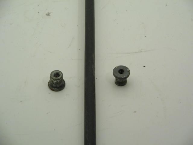 DOOR CHECK STRAP NUT