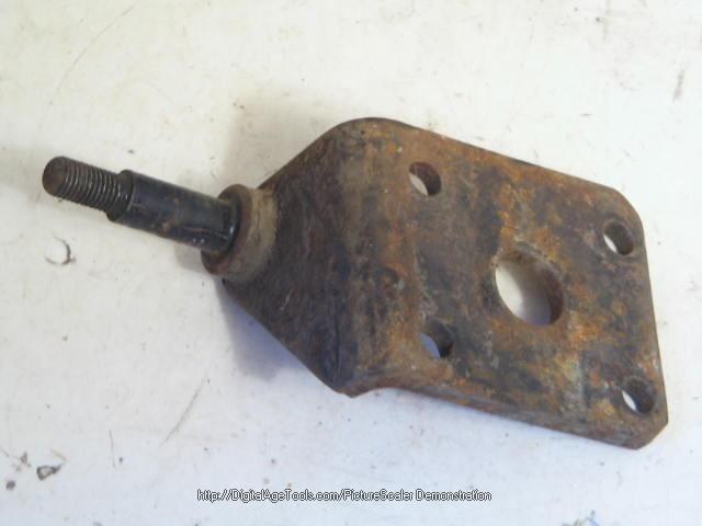 LEFT REAR SHOCK LOWER MOUNT