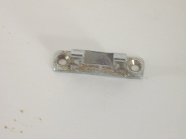 TRUNK LOCK CATCH