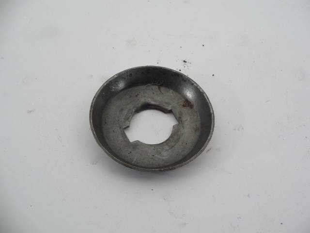 DEFLECTOR UNDER FR PULLEY NUT