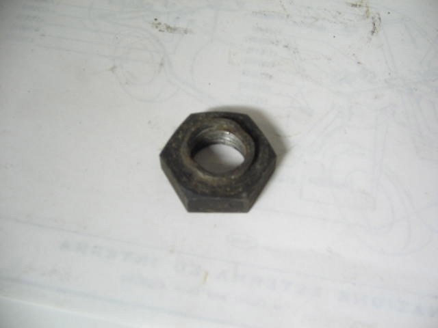 NUT AT REAR OF FRNT DRIVESHAFT