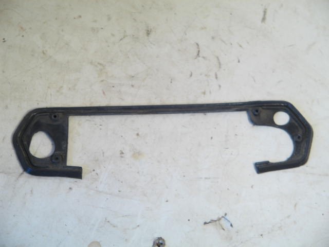 LEFT DOOR HANDLE PLASTIC TRIM