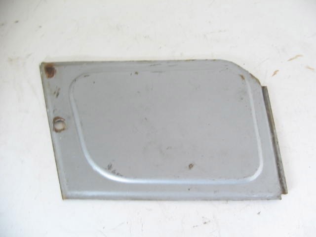 LEFT HEADLAMP MOTOR COVER