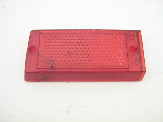 1975-78 LEFT CENTER RED LENS