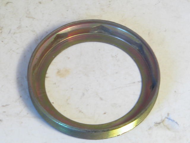 REAR WHEEL BEARING RETAINER