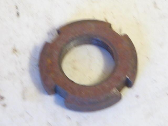 NUT ON CLUSTER GEAR FRONT