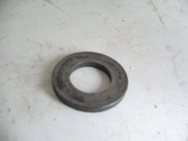 WASHER BEHIND NUT ON AXLE