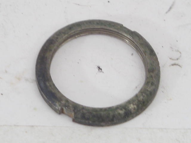 TRUNK LOCK RETAINING LOCK RING