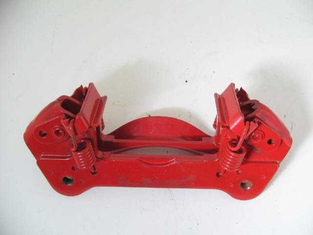 FRONT CALIPER MOUNTING BRACKET