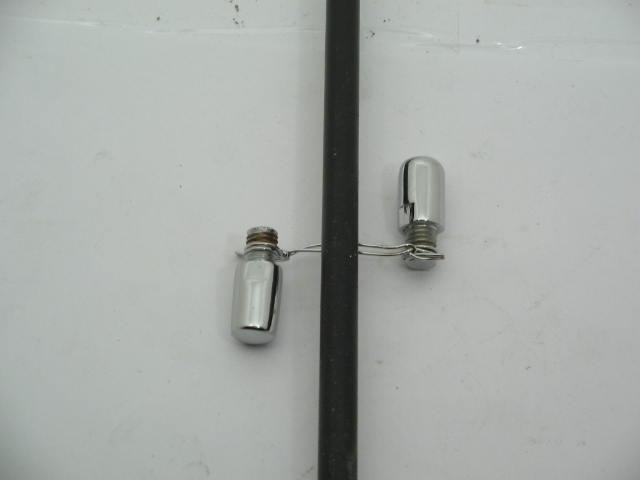 CHROME POST AT TOP OF A PILLAR